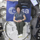 ESA astronaut Samantha Cristoforetti is holding a smile—and her knees—as she prepares for a double backflip in zero gravity on the International Space Station.